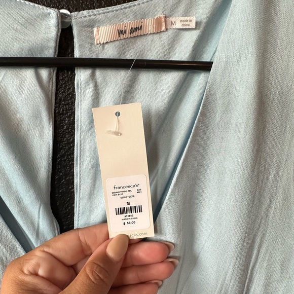 NWT. Light blue ruffle romper. - Picture 2 of 2